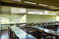 LISBON, PORTUGAL - MAY 14 2013: the faculty of Humanities at the University of Lisbon. Compared to the nearstanding school of Engineers, this faculty looks like a derelict building. In the last decades Humanities have lost students, and funds. Perceived as less profitable that scientific carrers, Philosophy, Literature, and Classical History are quickly fading from the educational offer. Not by elimination, but by slow and simple starvetion. Another basic asset sacrified for the sake of immediate profitability.