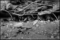 ISRAEL. The Kippur War. October 6th-10th, 1973. 
Israeli Defense Minister Moshe DAYAN in his bunker, during an Israeli counter-attack on the Golan Heights. The bunker had just been captured from Syrians, then hit by their artillery.