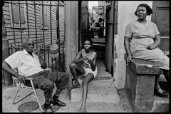 U.S.A. Louisiana. New Orleans. 1968. African-Americans resting on their porch.
