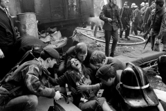 GB. Northern Ireland. Belfast. 1972. A woman wounded by an IRA bomb explosion in the city centre, is given first aid.