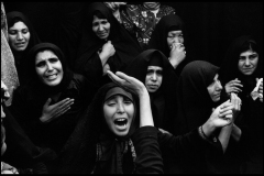 IRAN. Tehran. Behesht Zahra cemetery. April 1979. On the 40th day after his death, women from the Darvazeh Ghar neighborhood, mourn a "Martyr of the Revolution", killed accidentally by a militia friend manning a gun.