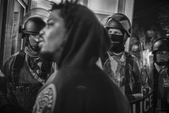 This series of photographs covers events in Ferguson over two time periods. The first about ten days after the shooting of Michael Brown by policeman Darren Wilson, and the second, after the Grand Jury decision which declined to file charges against the the officer. Photo by David Butow/Redux