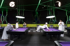 Dubai, United Arab Emirates, January 5, 2017
Hub Zero, an immersive entertainment hub, is a fully interactive gaming experience located in City Walk shopping mall. On this picture: Emirati boys are playing pool.
From the series 'Bread and Circuses'
